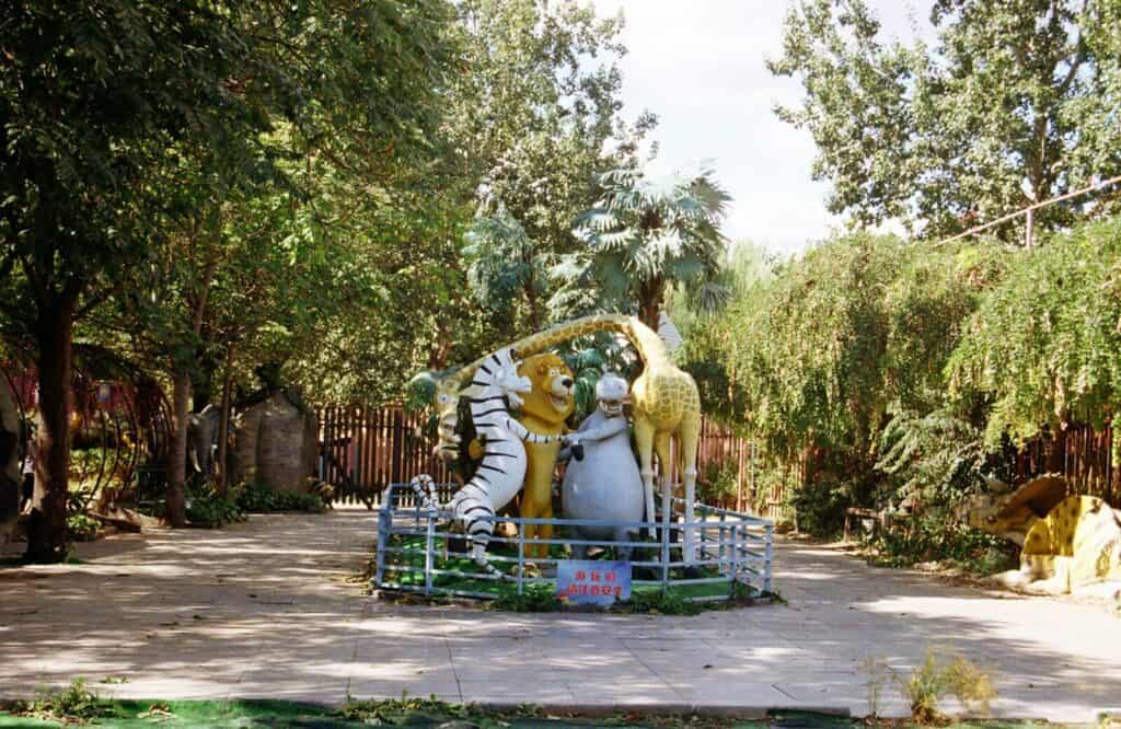 green and blue animal statue